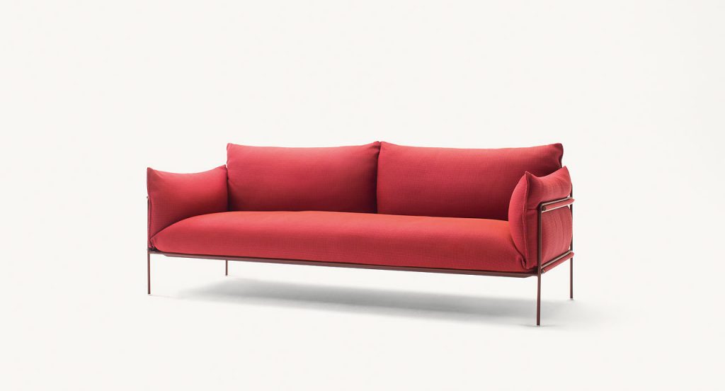 Kabà Sectional two seater sofa, structure and four legs in black steel, cushion in red polyester on a white background.