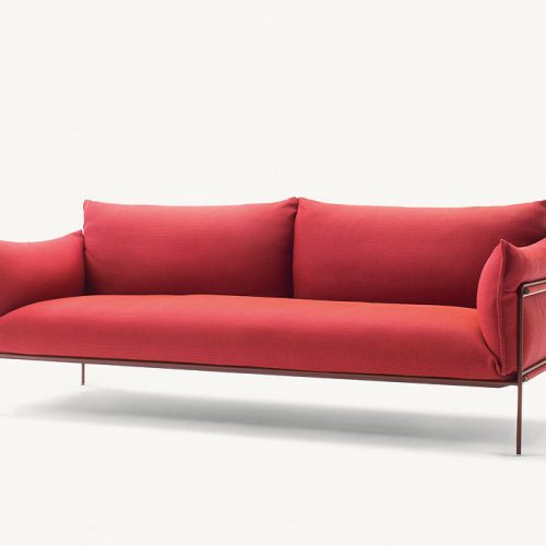 Kabà Sectional two seater sofa, structure and four legs in black steel, cushion in red polyester on a white background.
