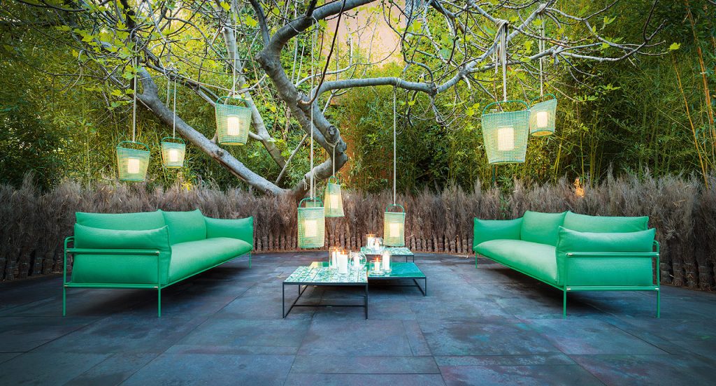 Two Kabà Sectionals, two seater sofa, structure and four legs in green steel, cushion in green polyester in a terrace.