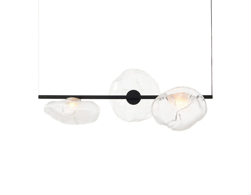 Boc Stem Suspension Light in matte black features three sculptural glass diffusers suspended horizontally. The contrast between the dark frame and translucent orbs creates a clean, artistic expression for modern interiors.