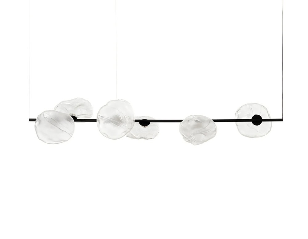 Boc Stem Suspension Light features a black horizontal stem paired with hand-blown glass orbs. Each orb’s organic form contrasts the linear structure, creating a refined, modern sculptural light.