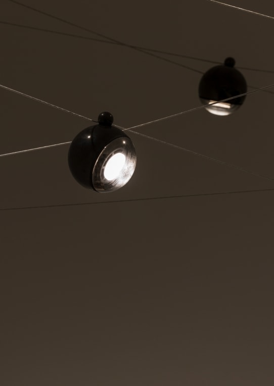 A 74 LED spotlighting system. Those are housed inside articulated mirrored spheres that are affixed with a magnet and coaxial cables on the roof.