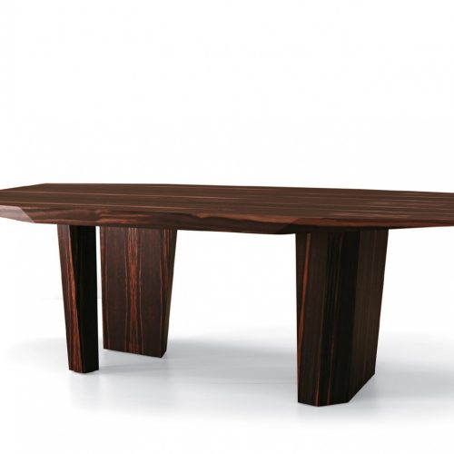 table characterized by the facets on the top made on a wood base flamed on a white background