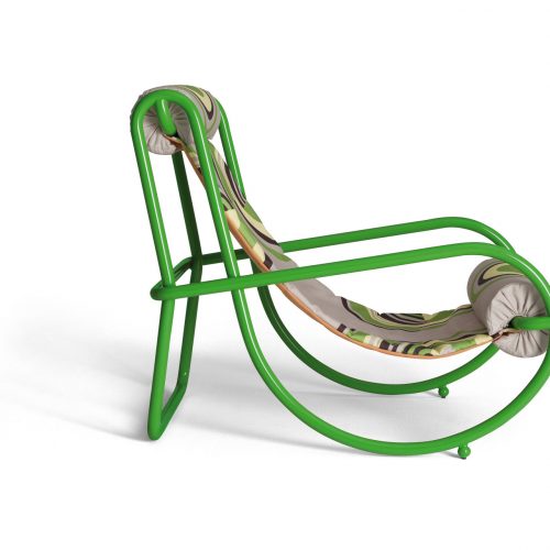 locus solus armchair in green with a green background