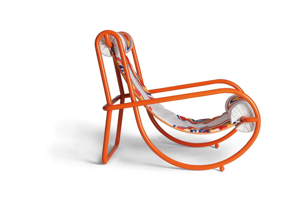 locus solus armchair being shown from the side in orange structure
