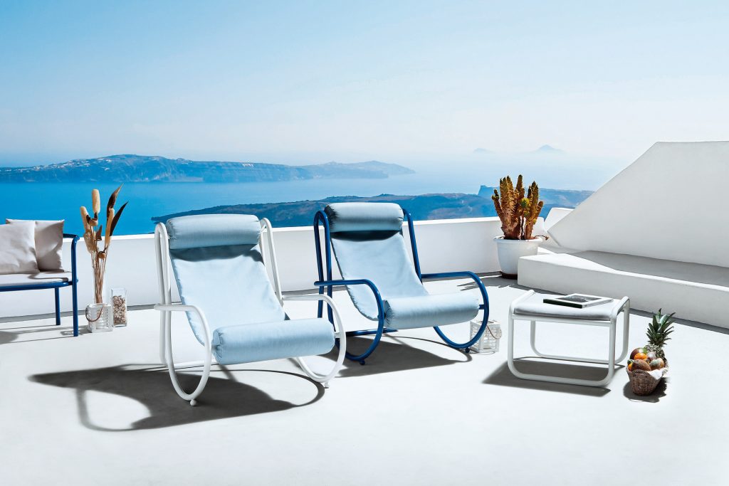 two locus solus armchair one in white strucutre and blue cover the other one in blue strucutre and blue cover
