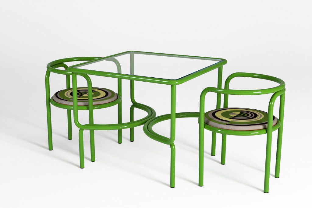 locus solus dining table with 2 dining chairs in green strucutre
