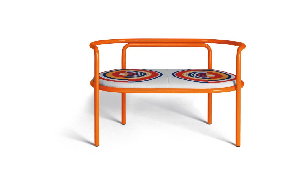 locus solus loveseat in orange with it's cushion