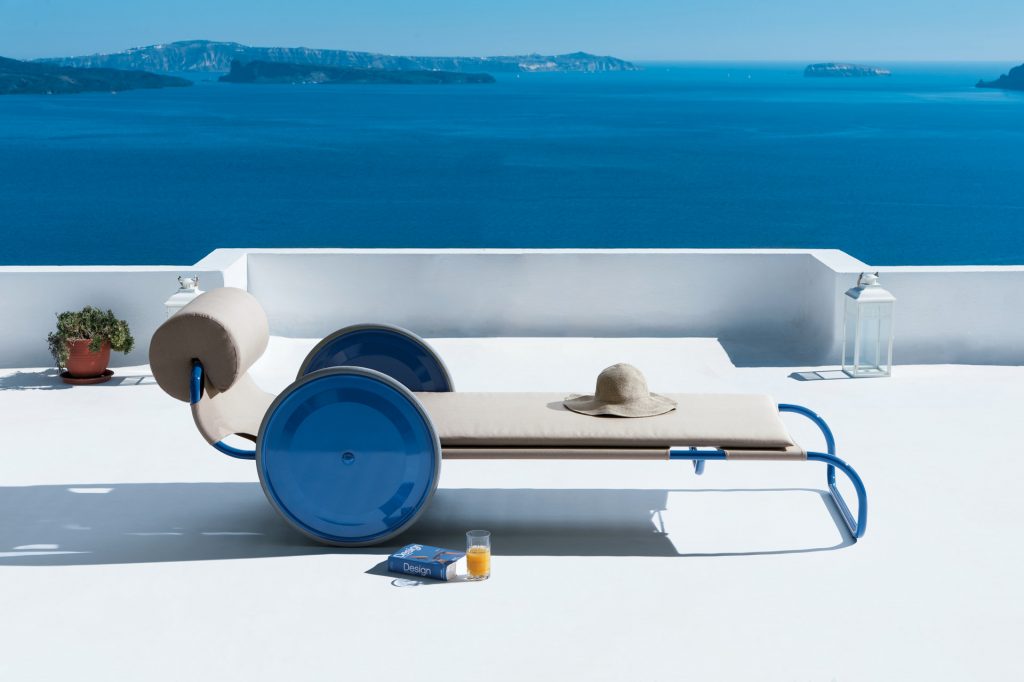 locus solus sun lounger in blue with an ocean view