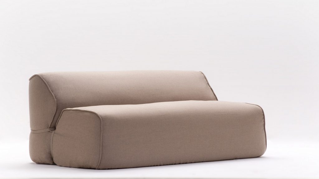 soft sofa in beige with a white background