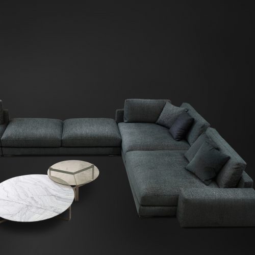 Myplace C: L shaped gray modular sofa with black legs ans cushions, on a black background.