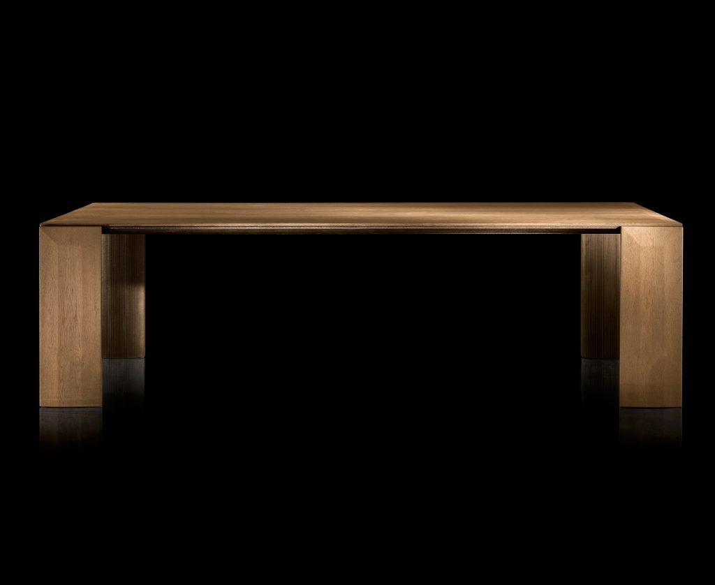 Rectangle LY Table. four rectangle legs and top in natural wood covered with silver steel on a black background.