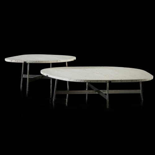 Two round Primitive Tables. Structure leg in metal rod finish burnished titanio. Top in white ostuni stone on a black background.