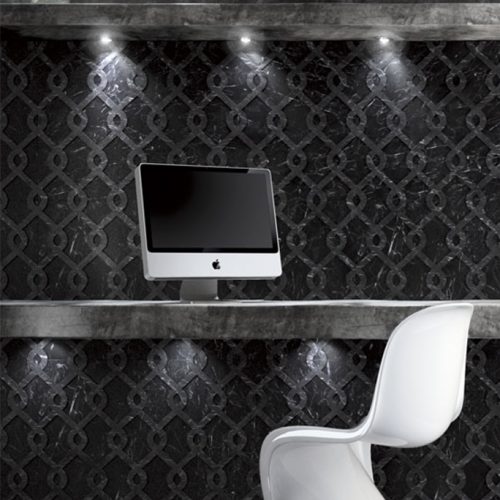Fortune finish mosaic in black with intricate fortune-inspired patterns on a wall.