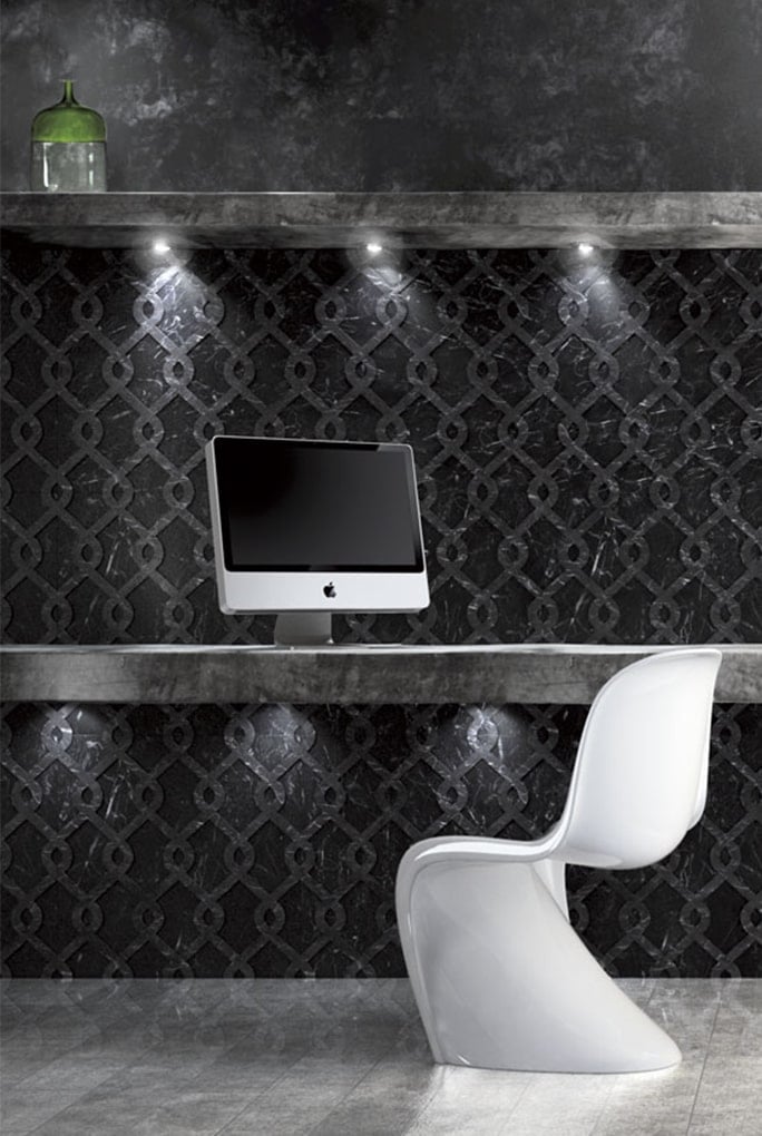 Fortune finish mosaic in black with intricate fortune-inspired patterns on a wall.