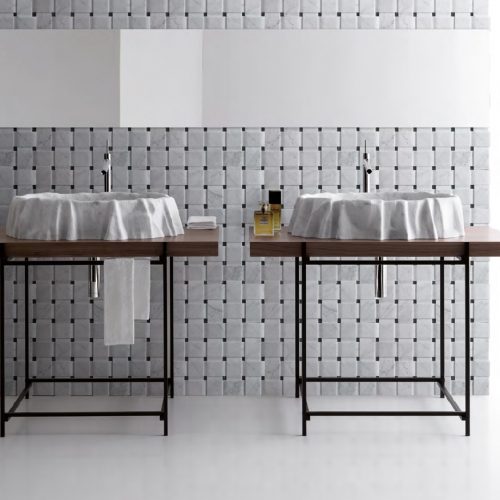 White Texo finish marble with woven patterns, in a bathroom.
