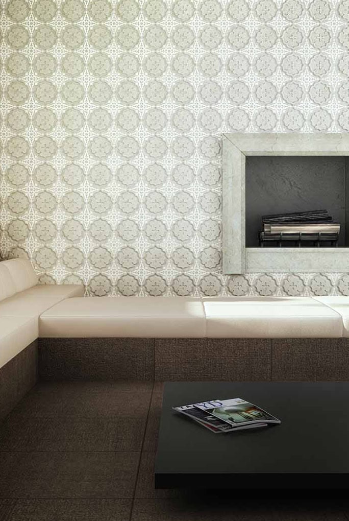 Waerlily marble with green floral patterns in front of a small couch.