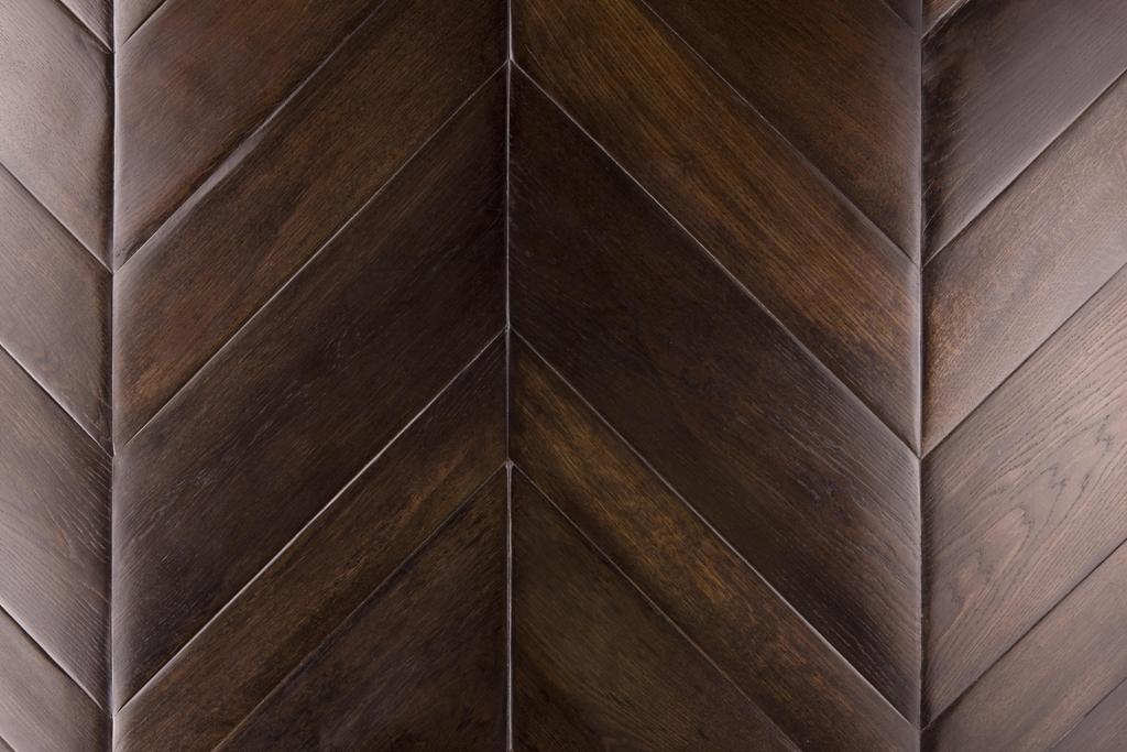 Historic wood finish in dark brown with a rustic, aged look.