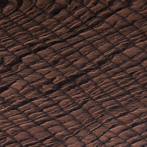 Arapaima material sample featuring a textured surface in shades of dark brown, resembling fish scales.