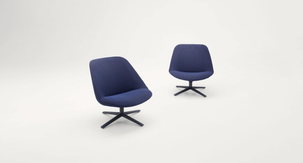 Two Swiveling and tilting Adele Armchairs, blue upholstery cover and black wooden base with four spokes on a white background.