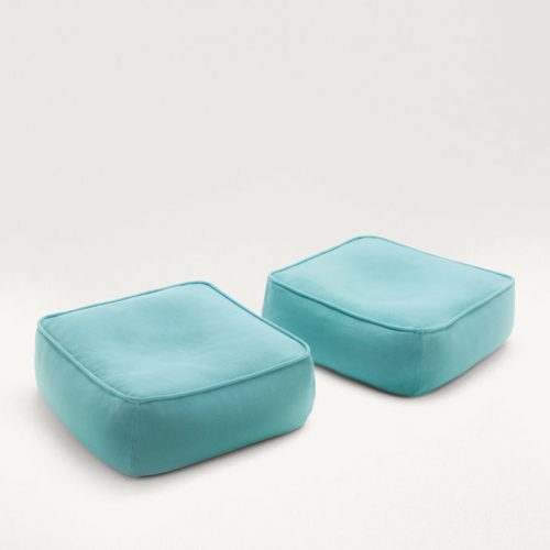 Two Float Outdoor Poufs, upholstery in blue fabrics on a white background.