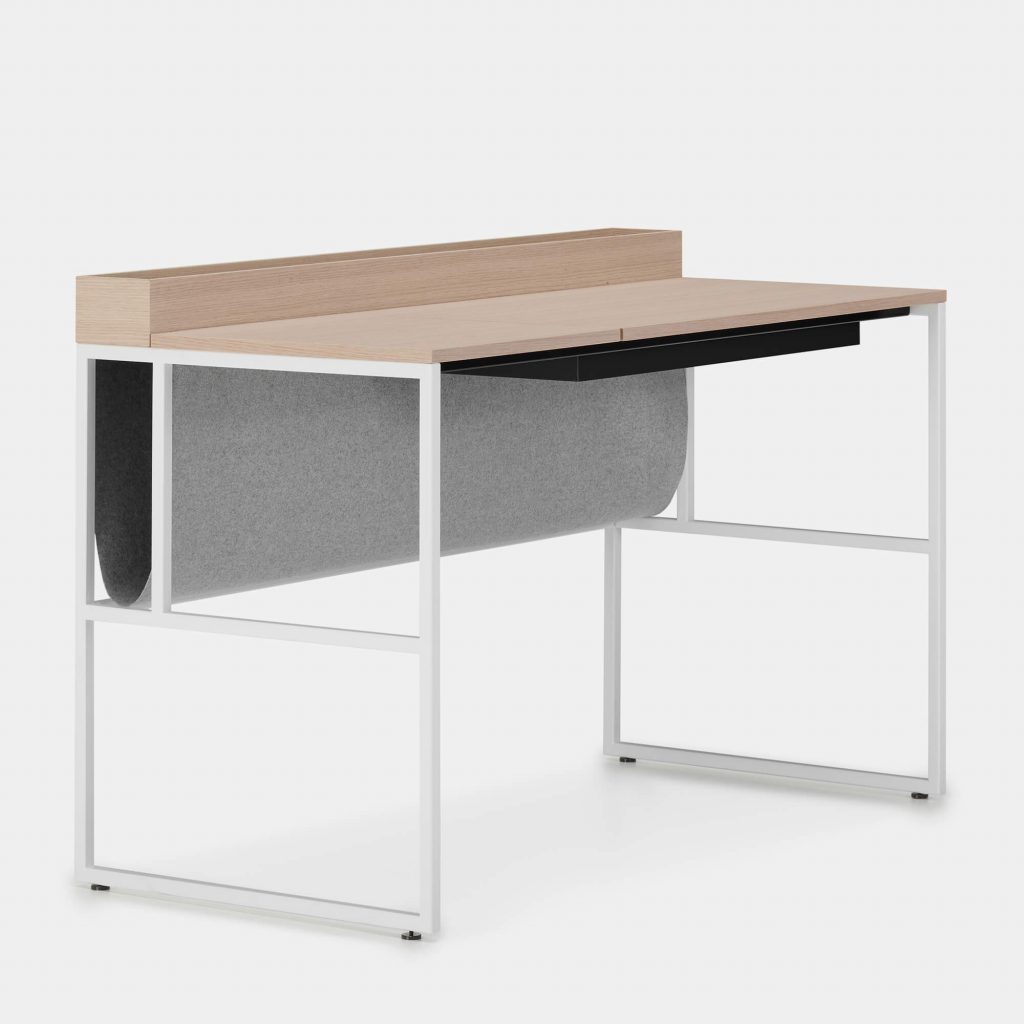 A Twenty Venti Home & Home Light desk, top in Bleached oak, white steel frame and legs, desk has a drawer that can be accessed through a flap door on the desktop with hydraulic lift on a white background.