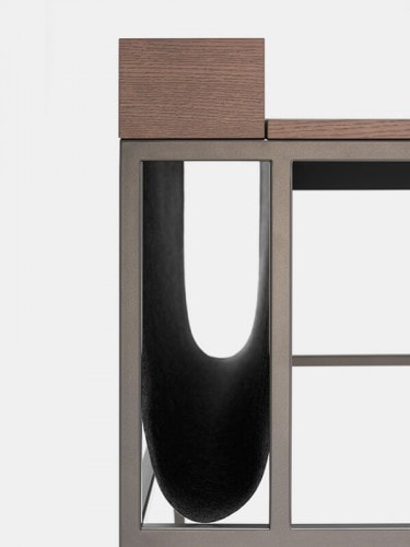 Close up of Twenty Venti Home & Home Light desk, top in light brown, bronze steel frame and legs, desk has a drawer that can be accessed through a flap door on the desktop with hydraulic lift on a white background.