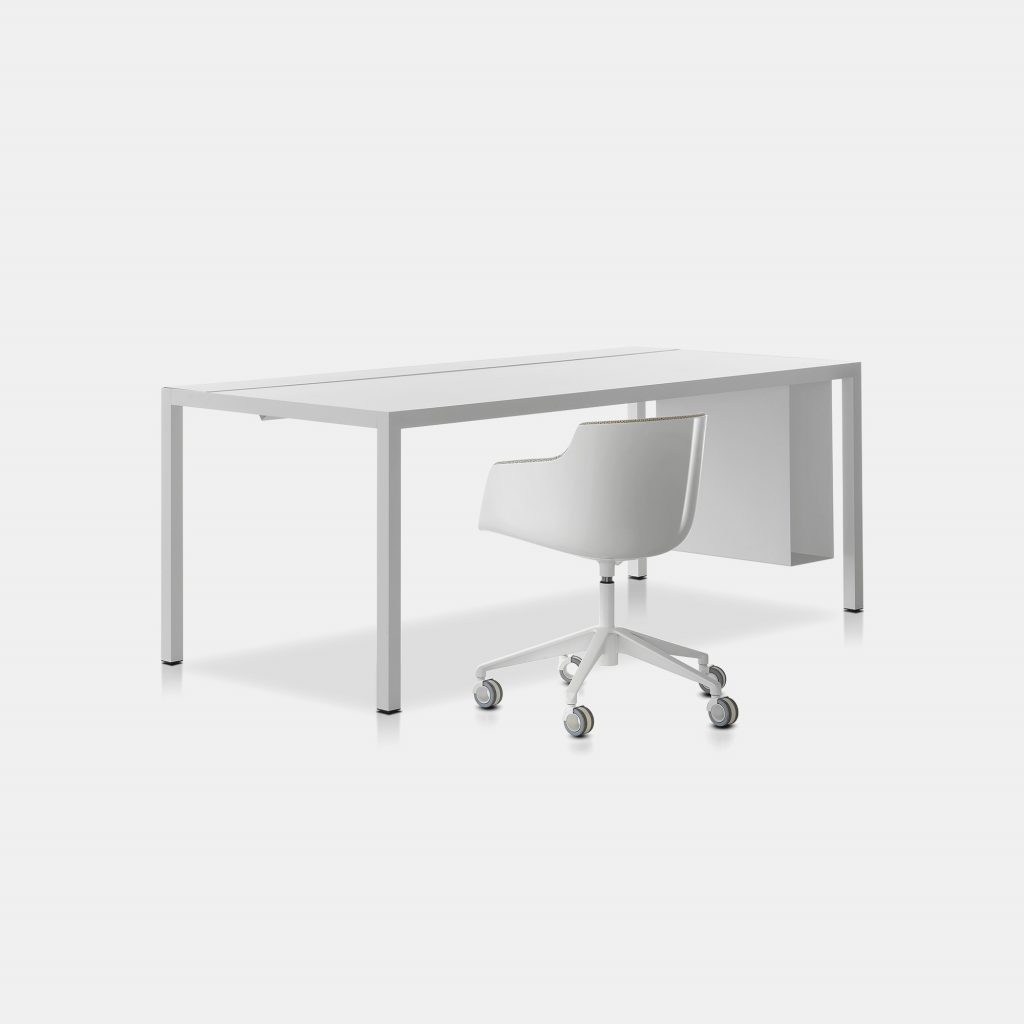 A white Desk 3.0. Rectangular shaped top with four legs in steel, a white steel PC holder and one white chair on a white background.