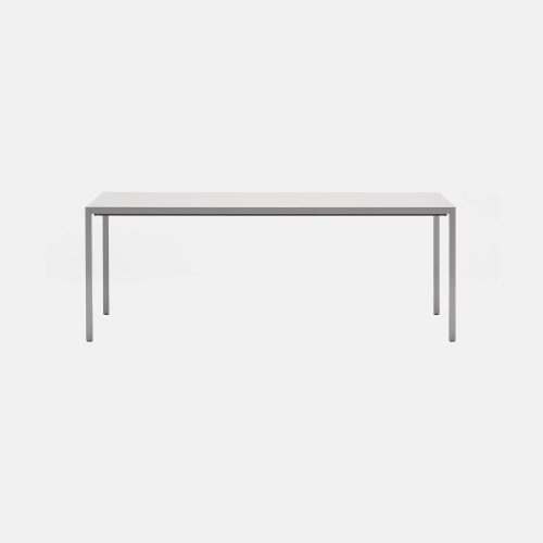 A Extension table, the laminate tabletops and extension tops in Fenix are built-in and are reinforced internally by thick aluminium sheets with four legs in aluminium on a white background.