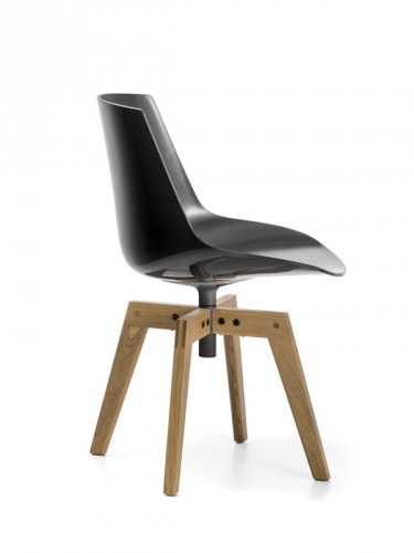 A black Flow Chair Color with a natural wooden bottom on a white room background.