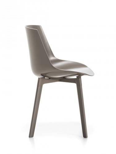 A coffee Flow Chair Padded with a coffee bottom on a white room background.