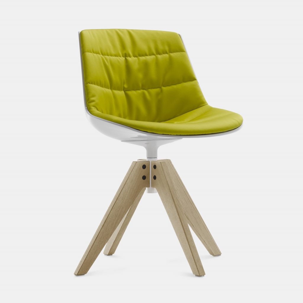 A yellow Flow Chair Padded with a natural wooden bottom on a white room background.