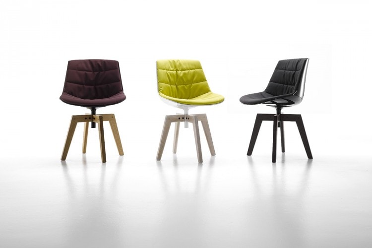 Three Flow Chairs Padded, one color purple, one color yellow and one color black with a natural wooden on a white background.z