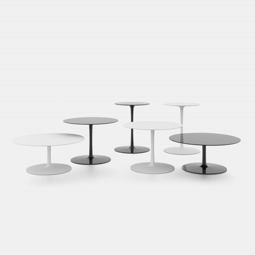 Three round coffee tables color white and two color black. Model name: Flow low table