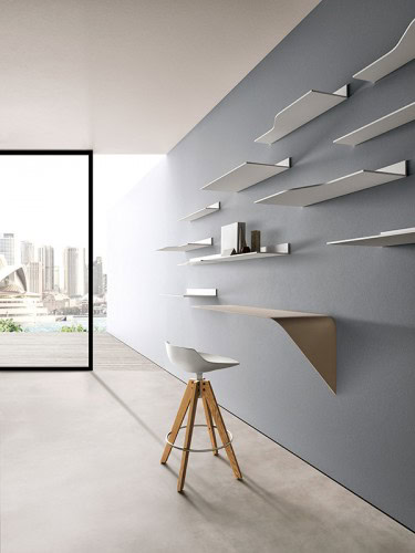 A Flow stool in matte white with four-legged base in natural oak in a study room background.