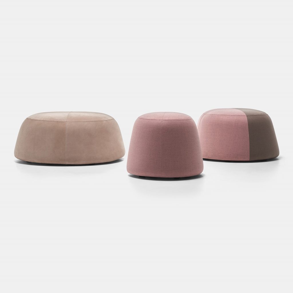 Three Fuji seats of different dimensions. One in porder pink and brown color, two in powder pink color on a white background.