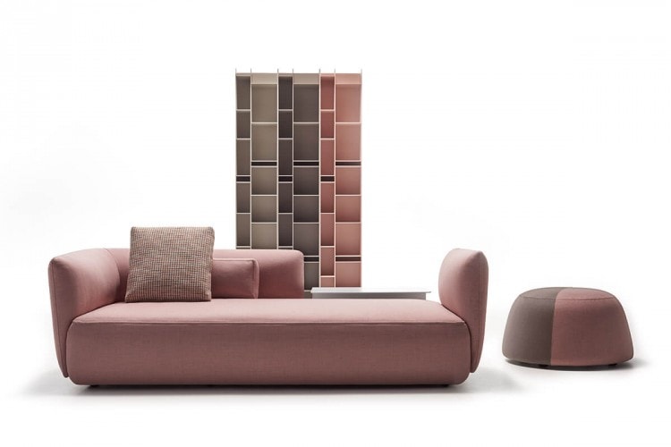 A powder pink and brown Fuji seat in a living room background