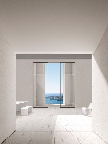 Two La Grande Tables made with a curved aluminium sheet. Finish in gloss white lacquered on a dining room background.