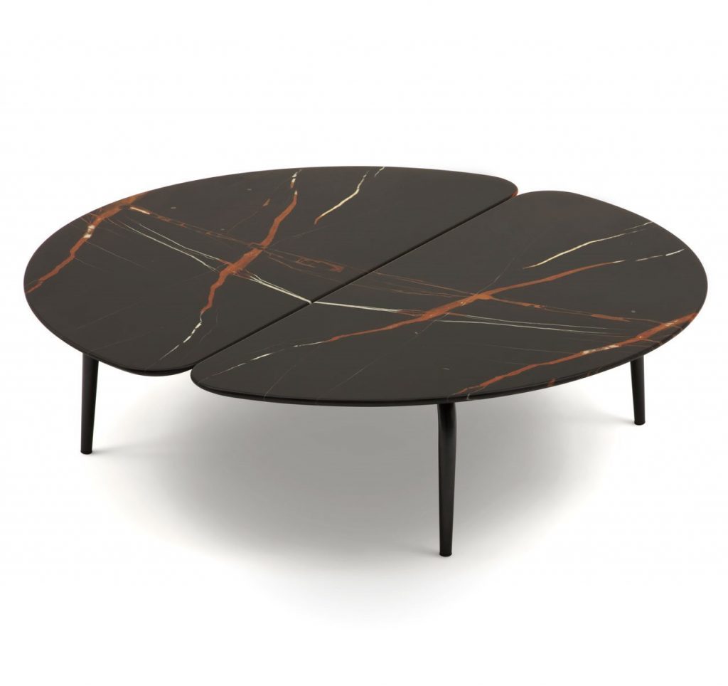 Graphium coffee table. Round black, white and brown marble top and four black legs on a white background.