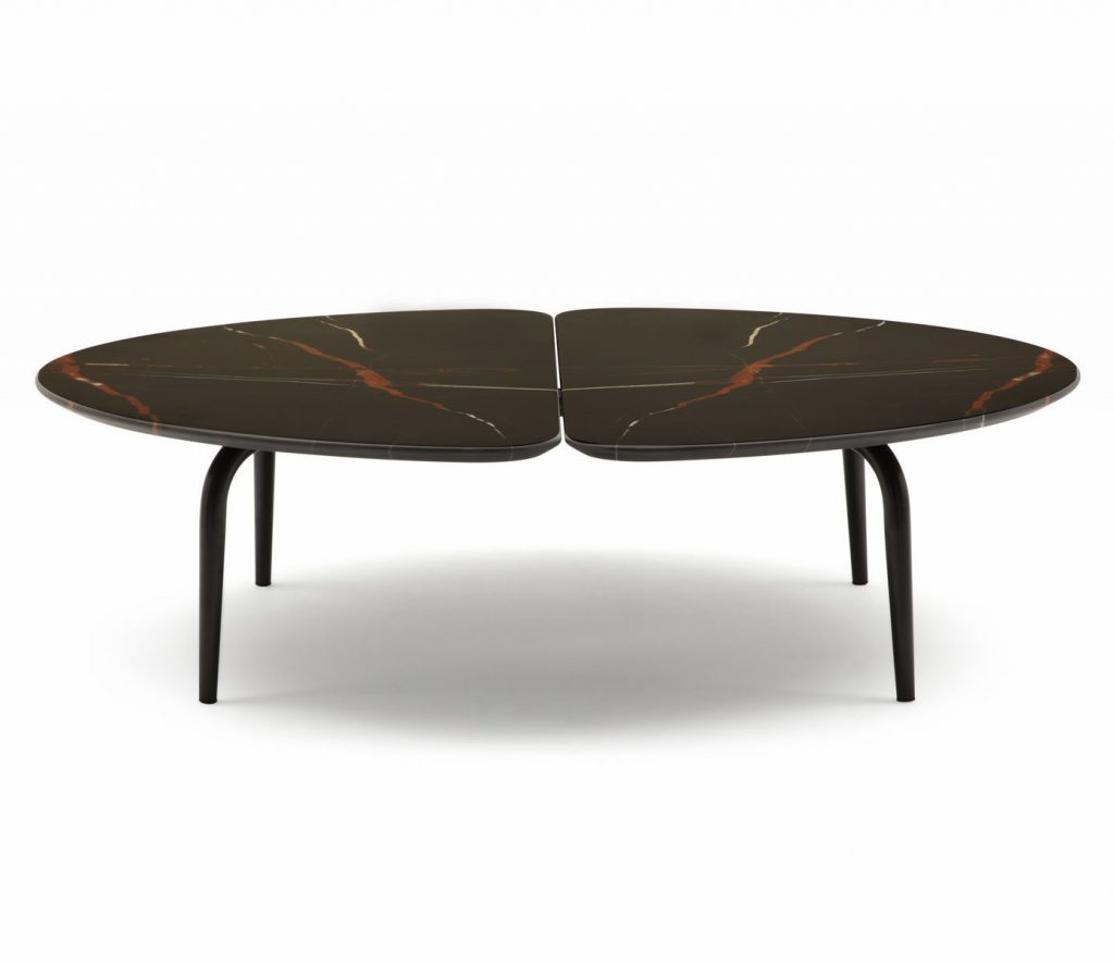 Graphium coffee table. Oval white and brown marble top and four black legs on a white background.