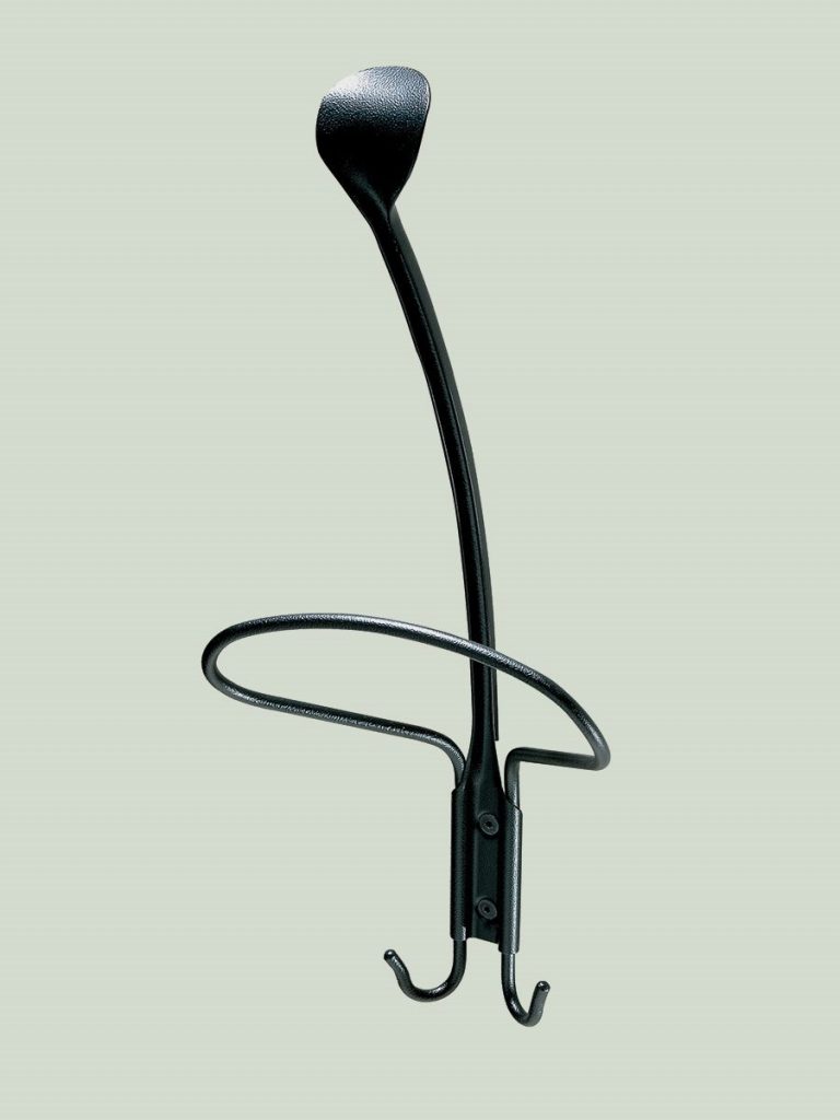 Museo coat hanger in black metal frame with irregular shape on a white wall.