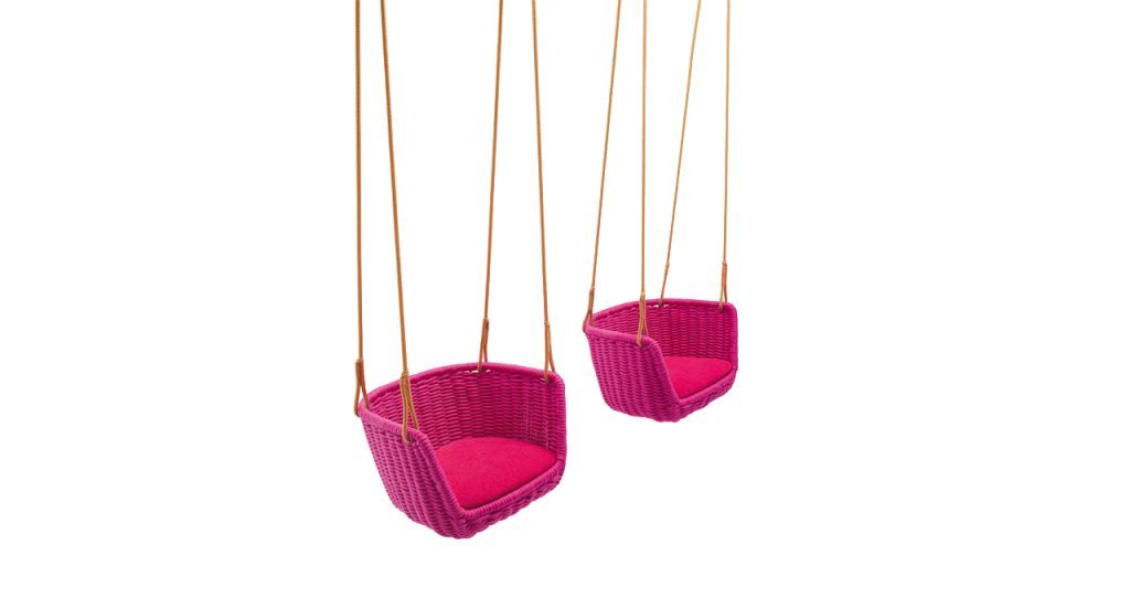 Playful suspended seating crafted with woven texture and vibrant color. The lightweight structure and soft cushion create a relaxed, inviting feel, adding movement and a bold accent to both indoor and outdoor settings.