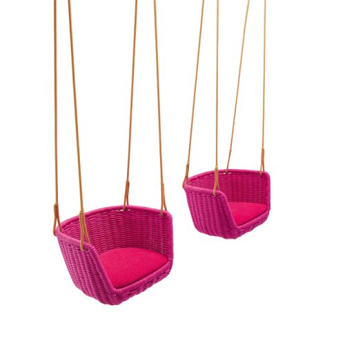 Playful suspended seating crafted with woven texture and vibrant color. The lightweight structure and soft cushion create a relaxed, inviting feel, adding movement and a bold accent to both indoor and outdoor settings.