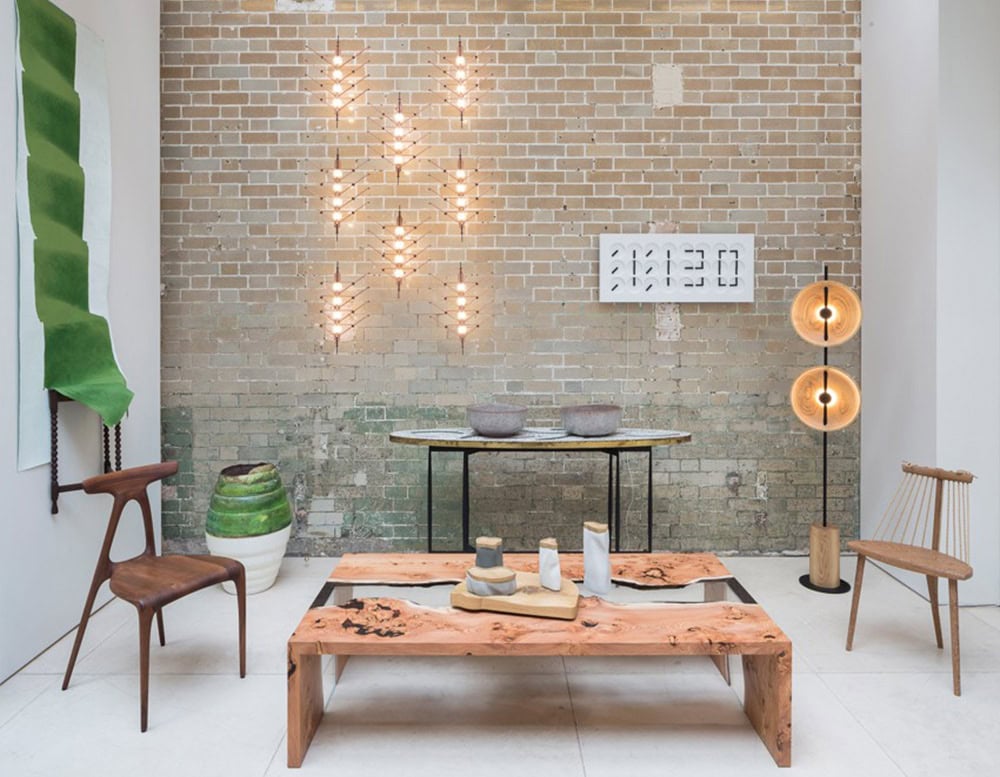 A striking coffee table crafted from natural wood and clear resin, creating a flowing river effect through the center. Its bold presence brings warmth and artistic detail to any interior setting.