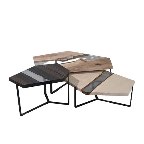 Crystal Wood Trio Coffee Table combines walnut, maple, and peatwood with resin, forming a modular set of geometric tables on steel bases, blending natural textures with modern design.
