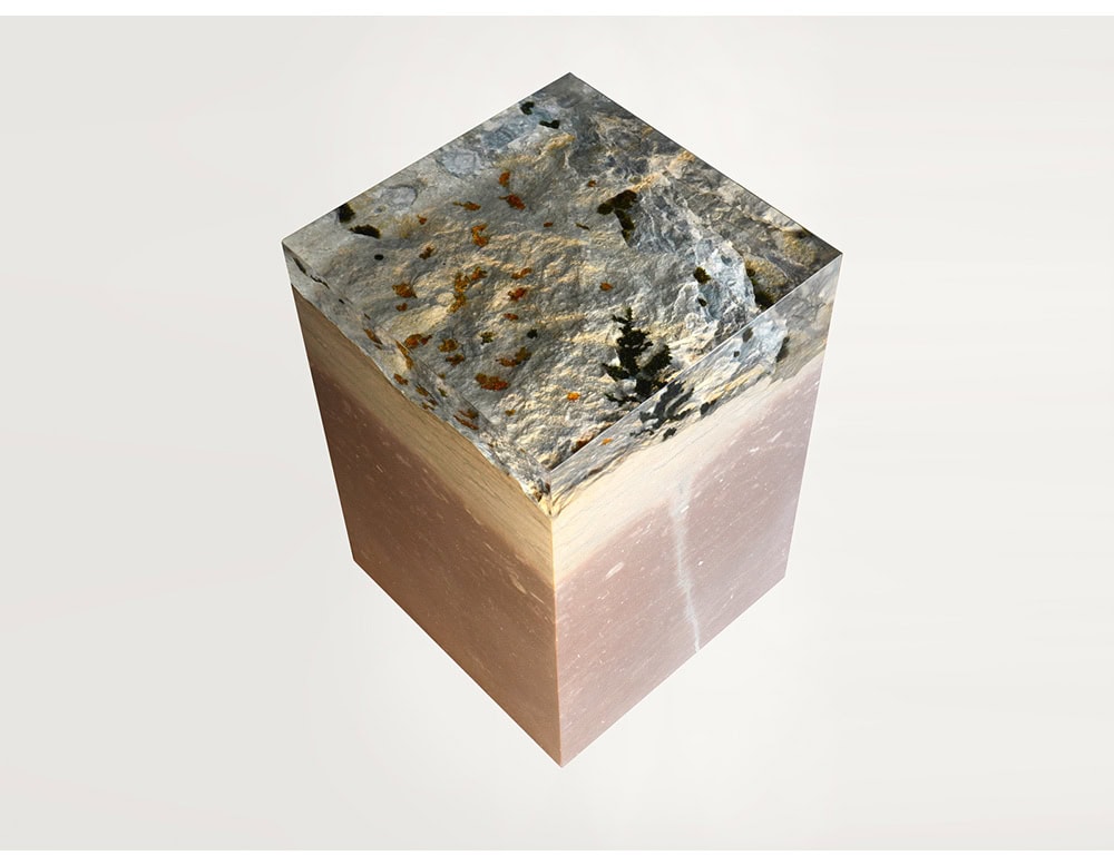 Crafted from dolomitic stone with natural moss details, the Dolomyth Stool brings raw mountain textures into a functional sculptural form. Its cubic shape contrasts organic surface with geometric precision.