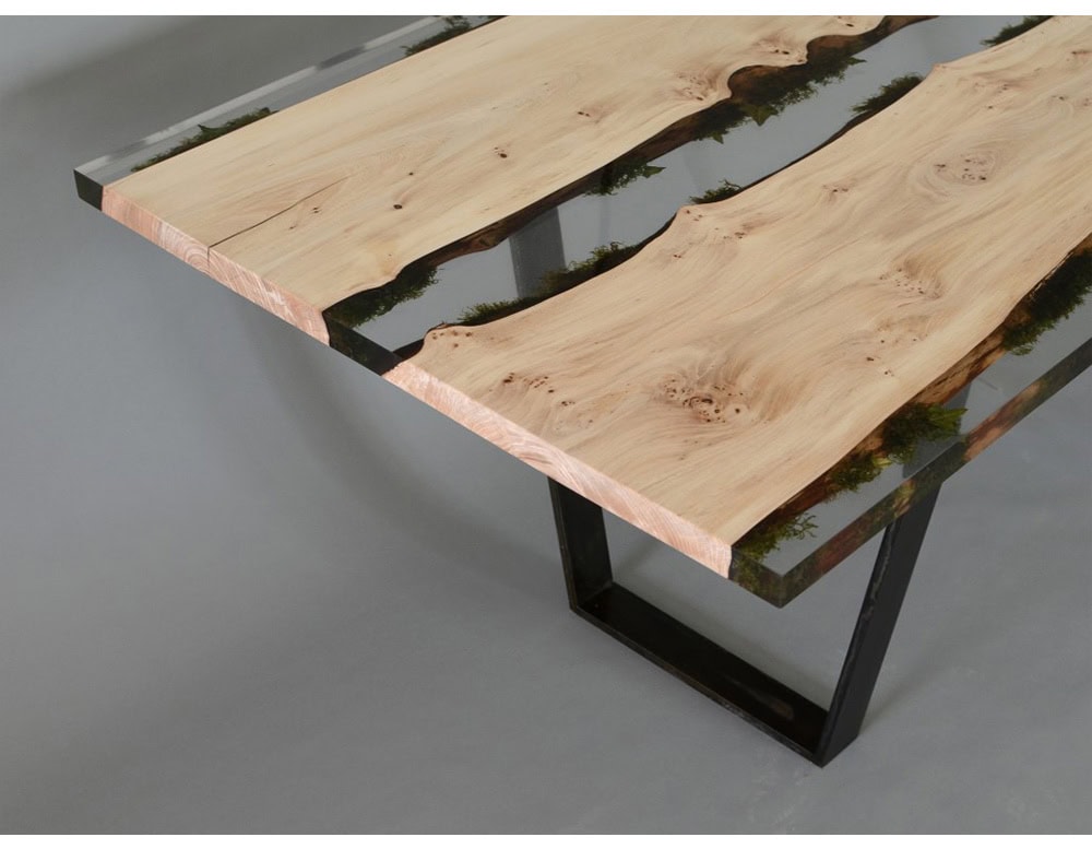 Moss Table blends natural wood and transparent resin with live moss details creating a striking balance of organic and modern design for interiors.