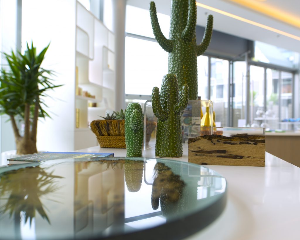 thin sculpture made of transparent polycarbonate and glass in a transparent color tone