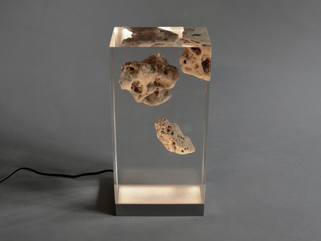 Floating Karst Lamp with a rectangular shape, featuring a natural stone base with a transparent resin inlay and a white lampshade, set against a white background.