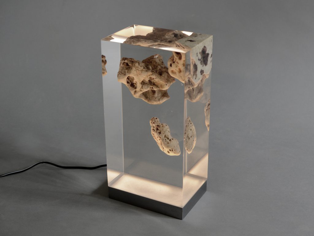 Floating Karst Lamp with a rectangular shape, featuring a natural stone base with a transparent resin inlay and a white lampshade, set against a white background.